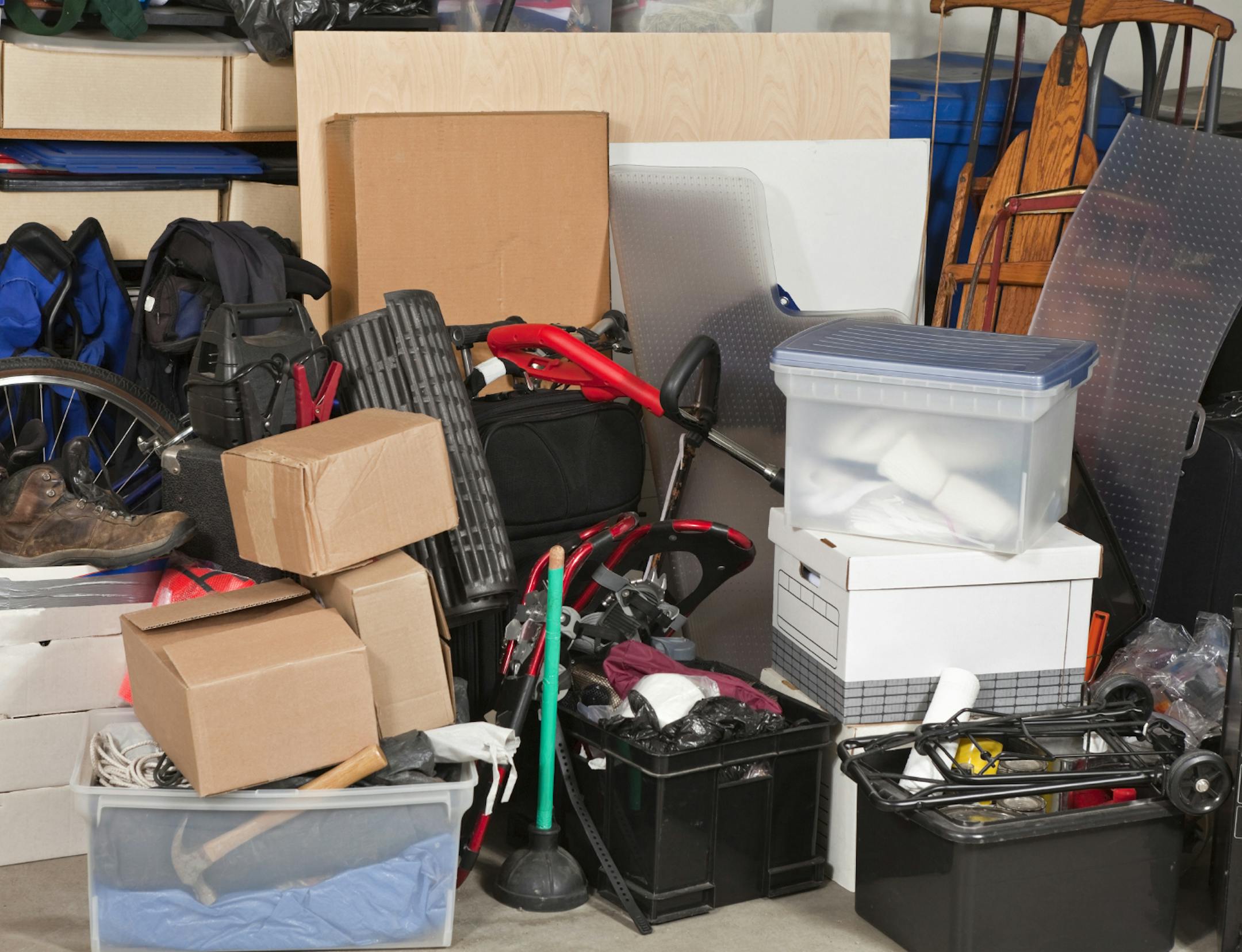 istockphoto.com; messy garage, boxes of stuff