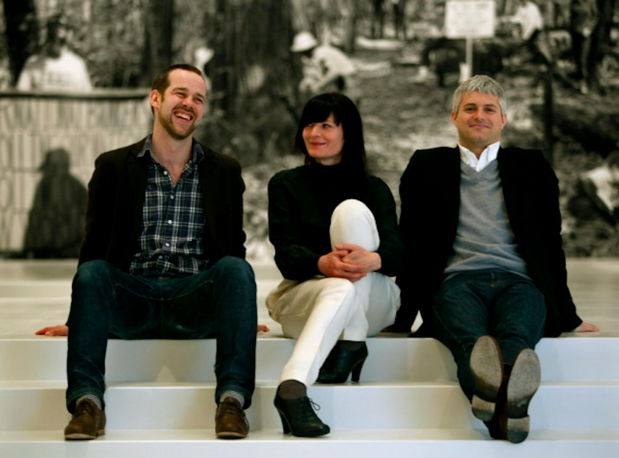 joelkoyama•jkoyama@startribune.com  art0422 20017429A   Polish-born, London-based artist Goshka Macuga is installing a small solo show at Walker including a 50 ft. long, 14 ft. tall tapestry about Walker's woodland history including woven portraits of past directors and artists standing in a forest glade. All part of a political investigation of WAC and Tea Party.  :]  (l to r) Bartholomew Ryan, Assistant Curator at the Walker, co-curator of Macuga exhibition, Goshka Macuga, and Peter Eleey, Curator of MOMA PS1, co-curator of Goshka Macuga exhibition at the Walker.    Goshka Macuga: It Broke From Within Combining the roles of reseacher, historian, and curator, Goshka Macuga explores ways in which modern and contempory art forms and museums have engaged evolving ideas and politics.  For her first solo museum exhibition in the United States, the London-based Polish artist delves into the Walker's past.