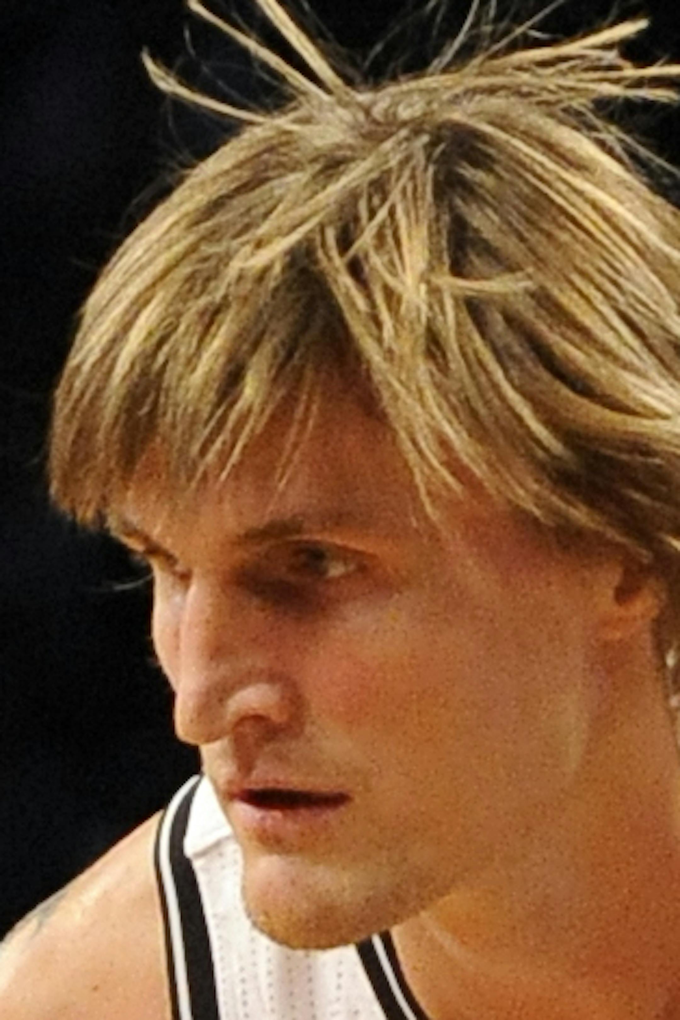 Brooklyn Nets' Andrei Kirilenko looks to pass against the Detroit Pistons during a preseason NBA basketball game on Saturday, Oct. 12, 2013, in New York. (AP Photo/Kathy Kmonicek) ORG XMIT: MIN2013112118463458