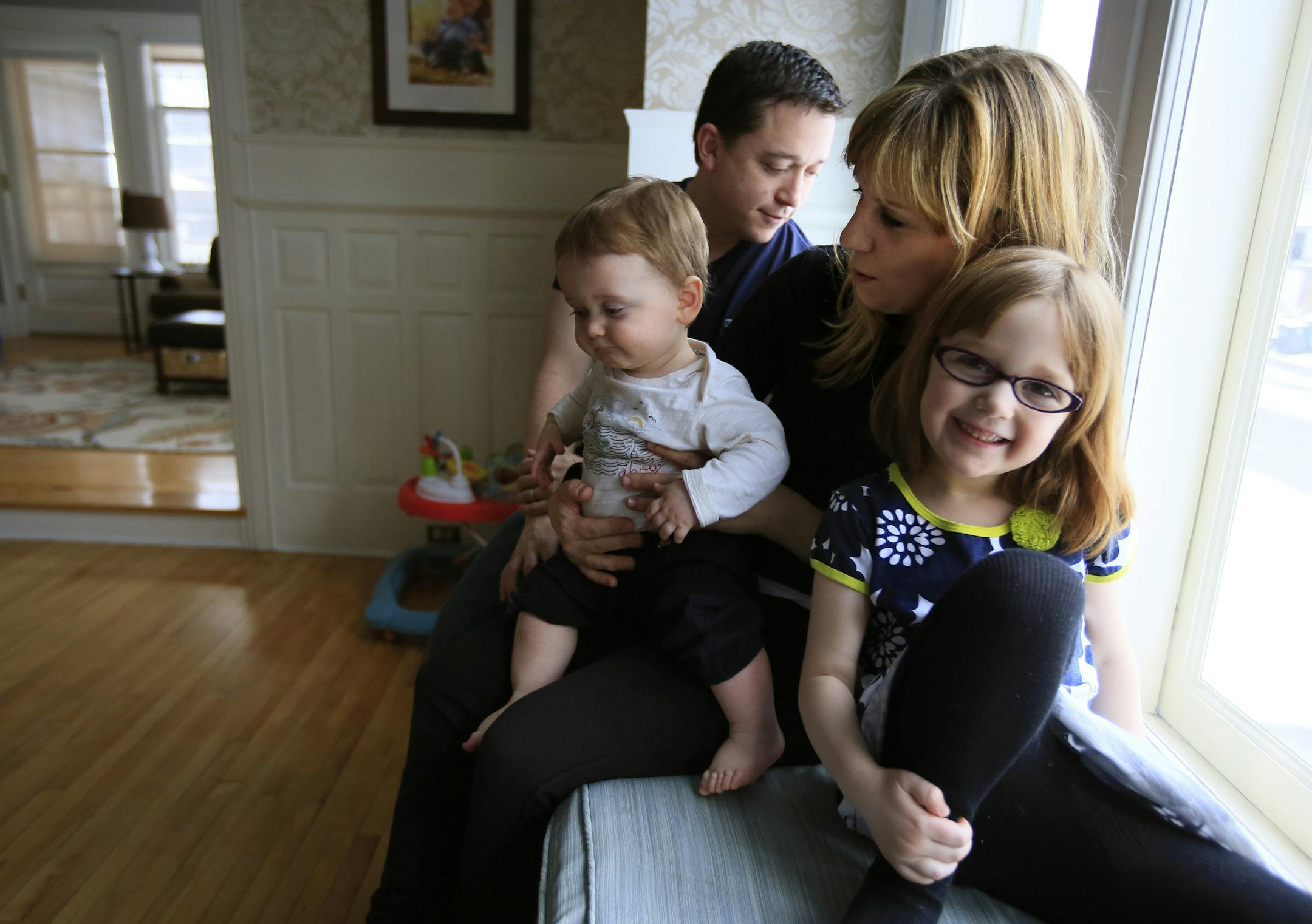 Emily and Brett Beugen with their daughter Sarah, 5, and son David, 11-months-old. The first program of its kind in Minnesota to treat mothers struggling with postpartum depression will open on April 15 at Hennepin County Medical Center. The mother-baby program will allow new mothers struggling with depression and other mental health issues to receive treatment during the day and not have to be admitted into the psych ward.] BRIAN PETERSON ‚Ä¢ brianp@startribune.com Minneapolis,