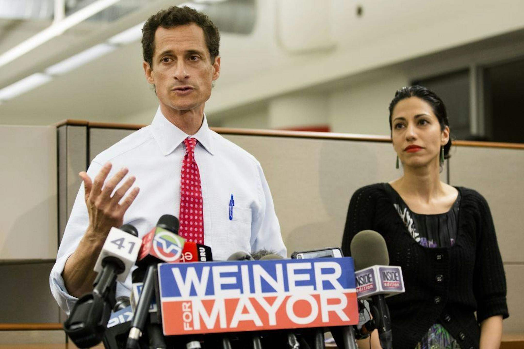 New York mayoral candidate Anthony Weiner speaks during a news conference alongside his wife Huma Abedin on Tuesday.