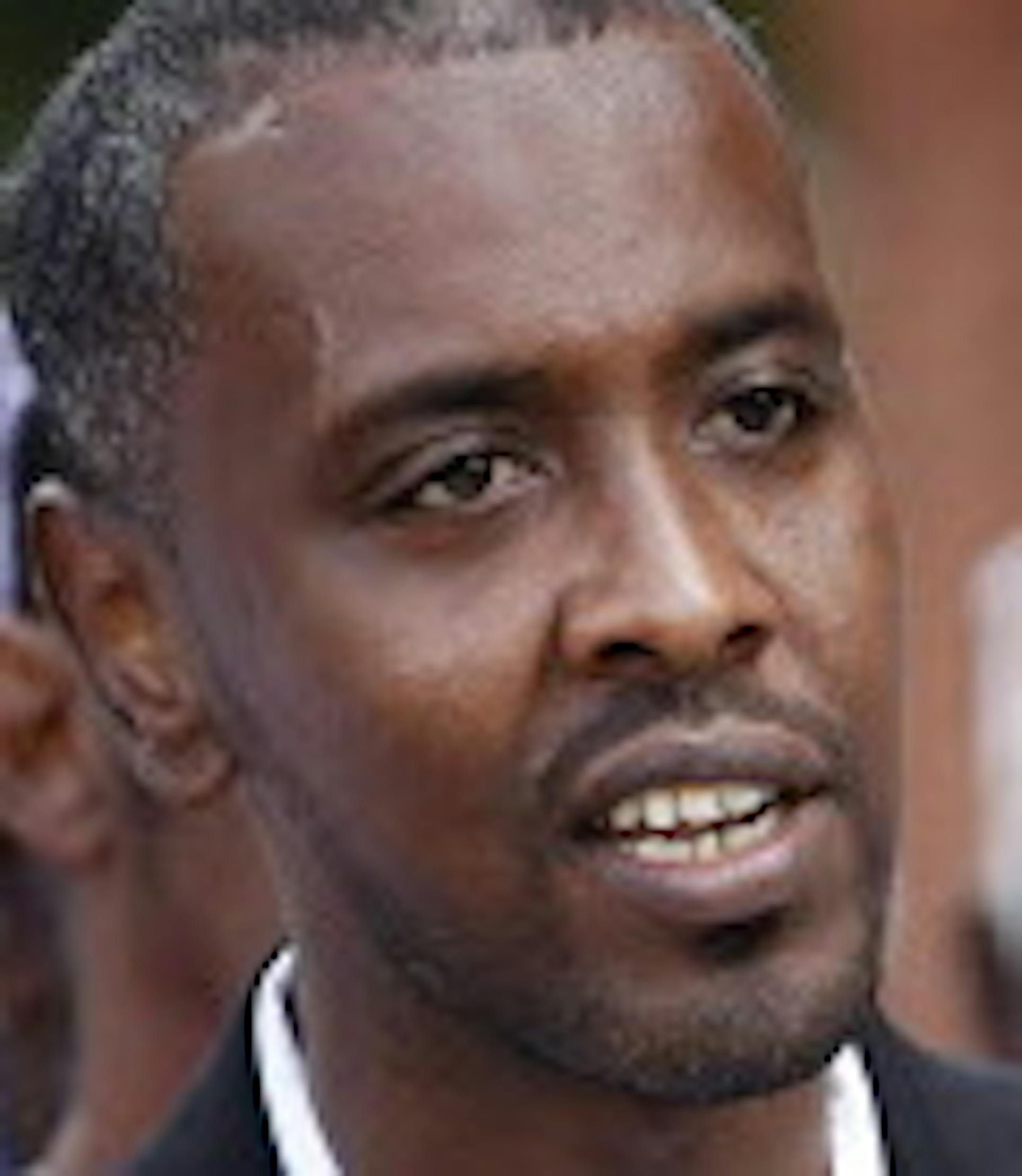 Minneapolis City Council Member Abdi Warsame held a press conference at the Darul Quba Cultural Center on Sunday. ] CARLOS GONZALEZ ï cgonzalez@startribune.com - July 23, 2017, Minneapolis, MN, Minneapolis City Council Member Abdi Warsame talks about the Damond shooting, along with members of the East African community.