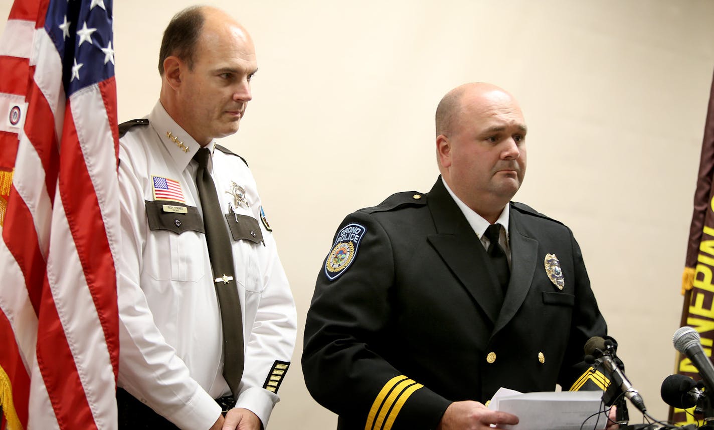 Orono Deputy Chief Chris Fischer, right, and Hennepin County Sheriff Richard Stanek spoke at a press conference at Minneapolis City Hall on Monday regarding the deaths of Dr. Stephen Larson and Ted Hoffstrom.