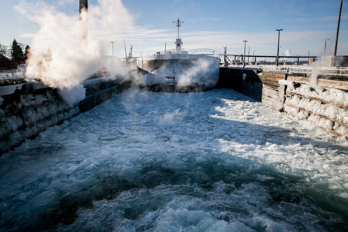 A 1000-foot freighter passes through the Soo Locks in Sault Ste. Marie, Mich., Jan. 12, 2018. ORG XMIT: MER570cd74ea436ab992da39d3d8b137