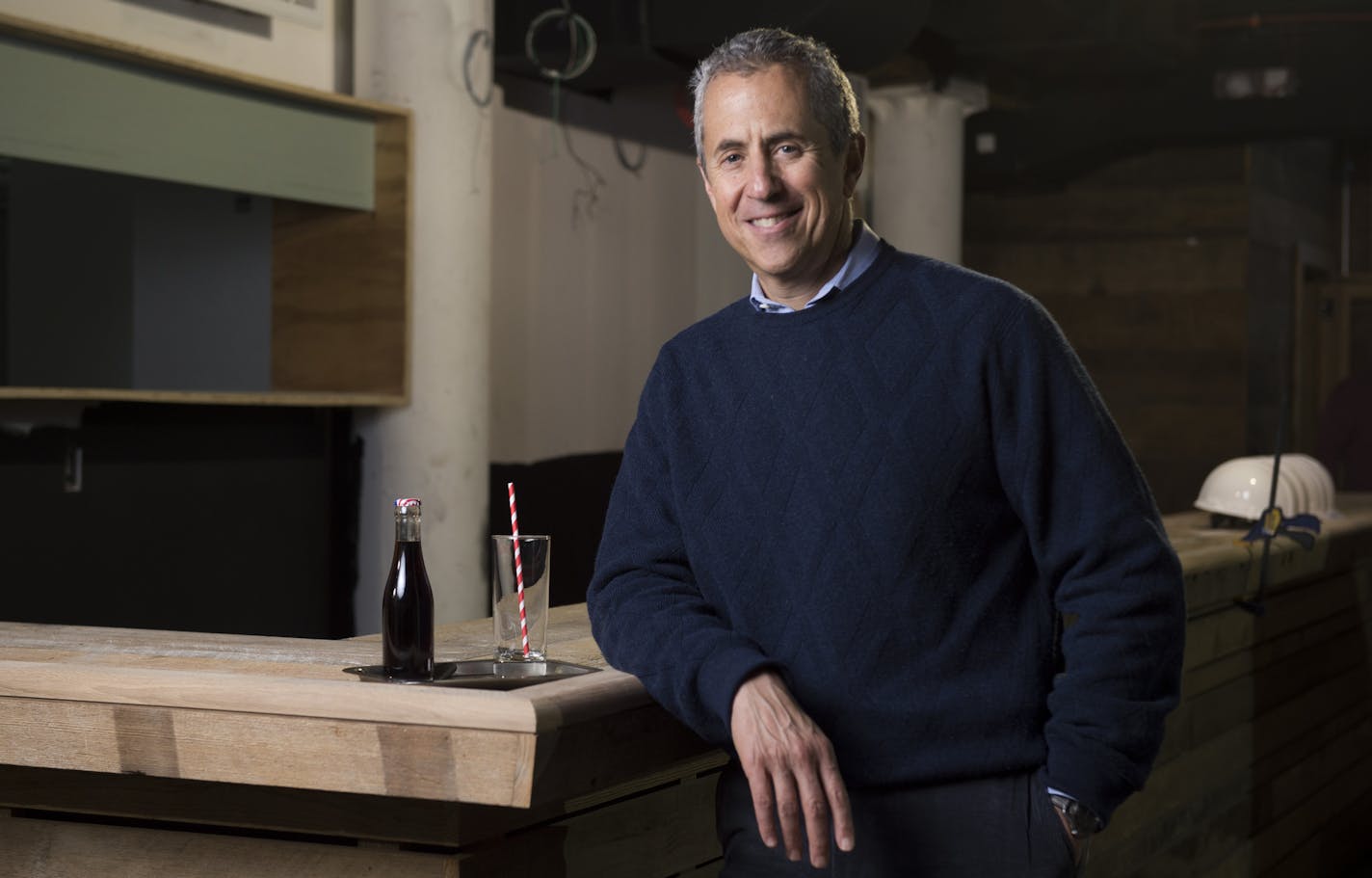 FILE -- Danny Meyer, chief executive of the Union Square Hospitality Group, at his bar Porchlight in New York, Feb. 2, 2015. In a sweeping change to how its restaurant employees are paid, Meyer announced Wednesday, Oct. 14, that the group will eliminate tipping at Gramercy Tavern, Union Square Cafe and its 11 other restaurants by the end of next year. (Evan Sung/The New York Times)