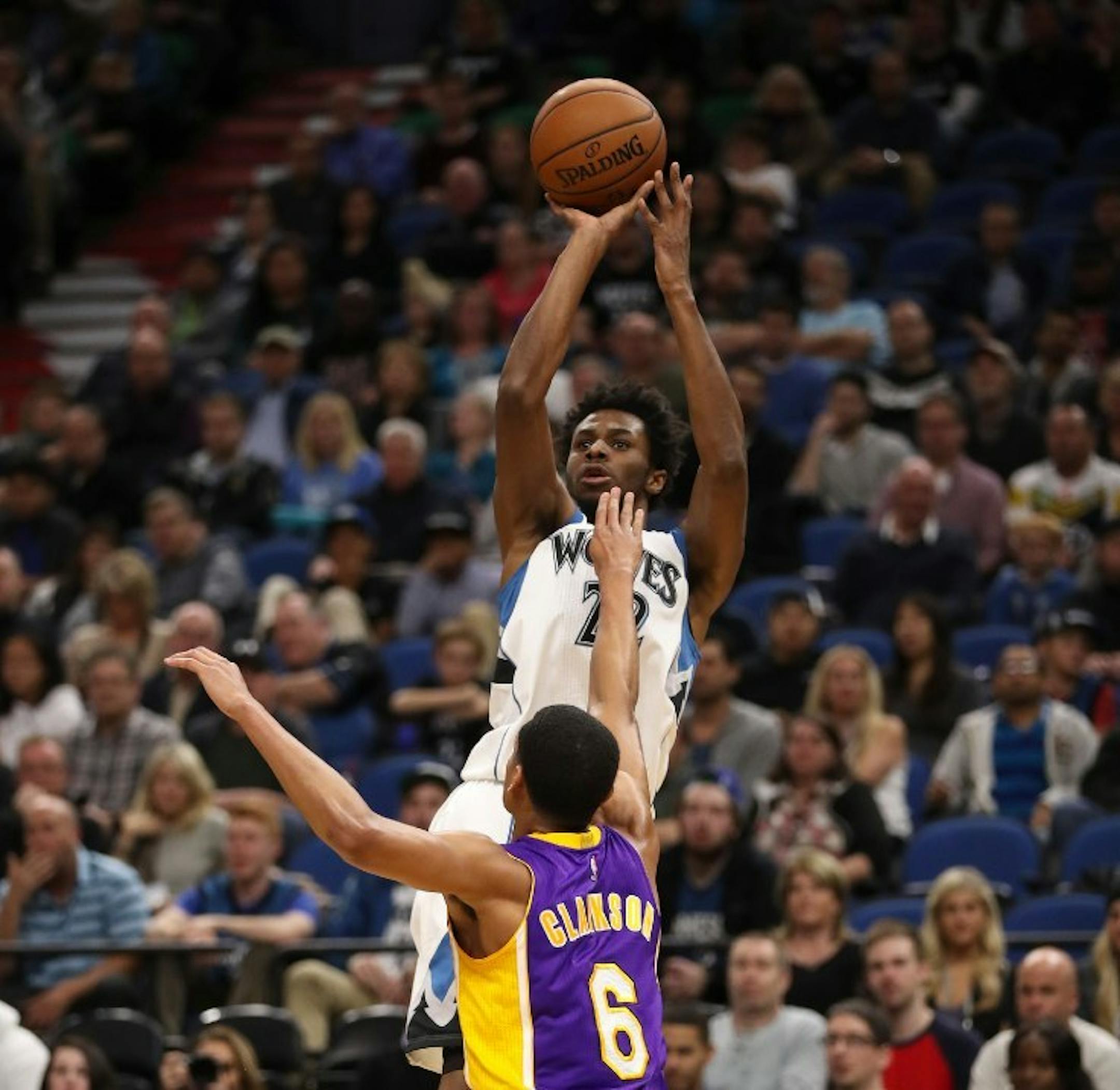 Timberwolves forward Andrew Wiggins (22) made a second quarter shot over Los Angeles Lakers guard Jordan Clarkson (6).
