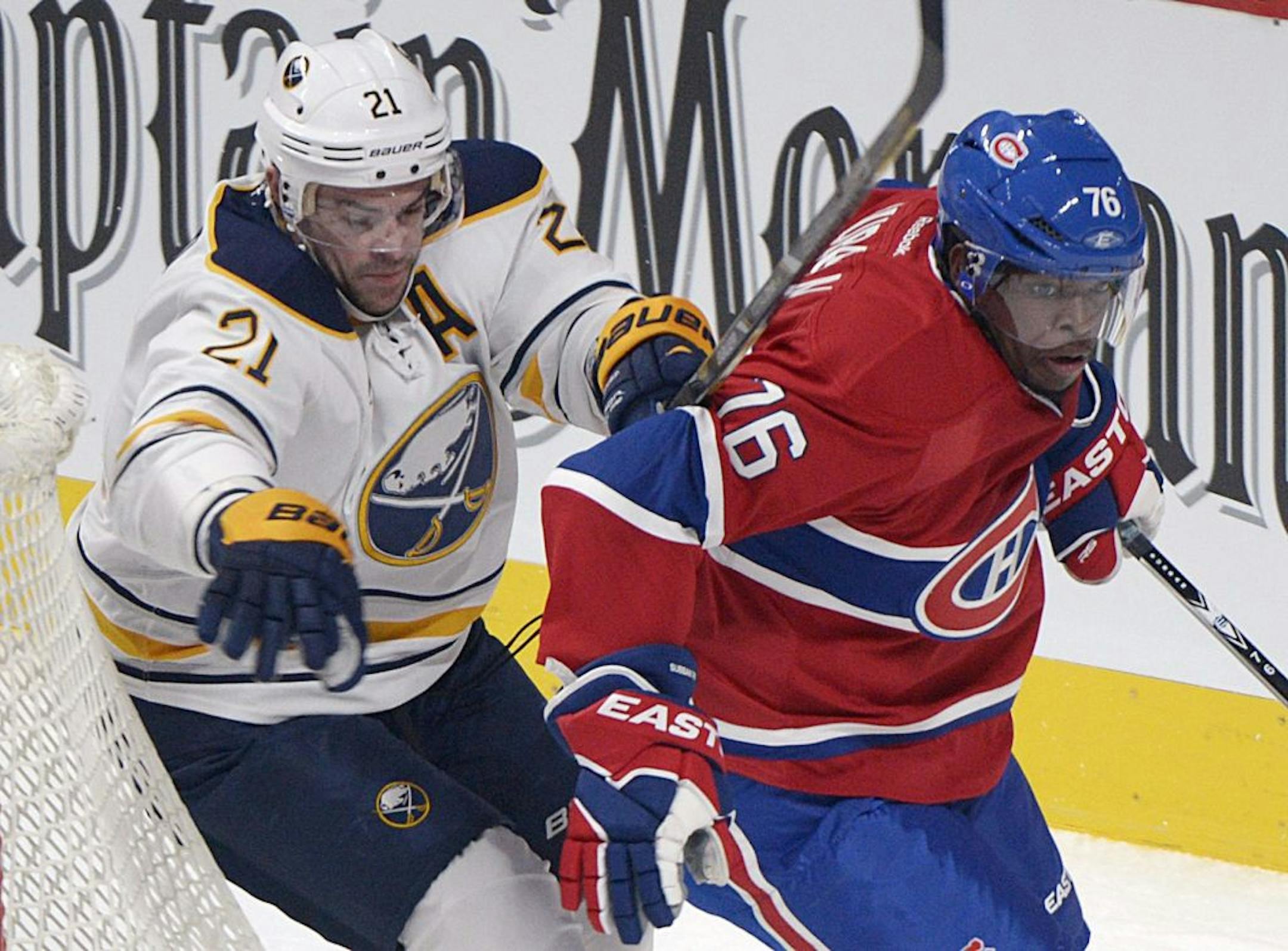 Montreal Canadiens' P.K. Subban, right, skates past Buffalo Sabres' Drew Stafford during first period NHL hockey action in Montreal, Saturday, Feb. 2, 2013.
