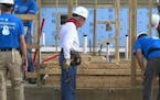 Former U.S. President Jimmy Carter helps build a home in Memphis, Tenn., for Habitat for Humanity on Mon., Aug. 22, 2016.