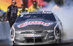 In this photo provided by the NHRA, Pro Stock driver and Minnesota native Jason Line competes in the Lucas Oil NHRA Nationals at Brainerd Internationa