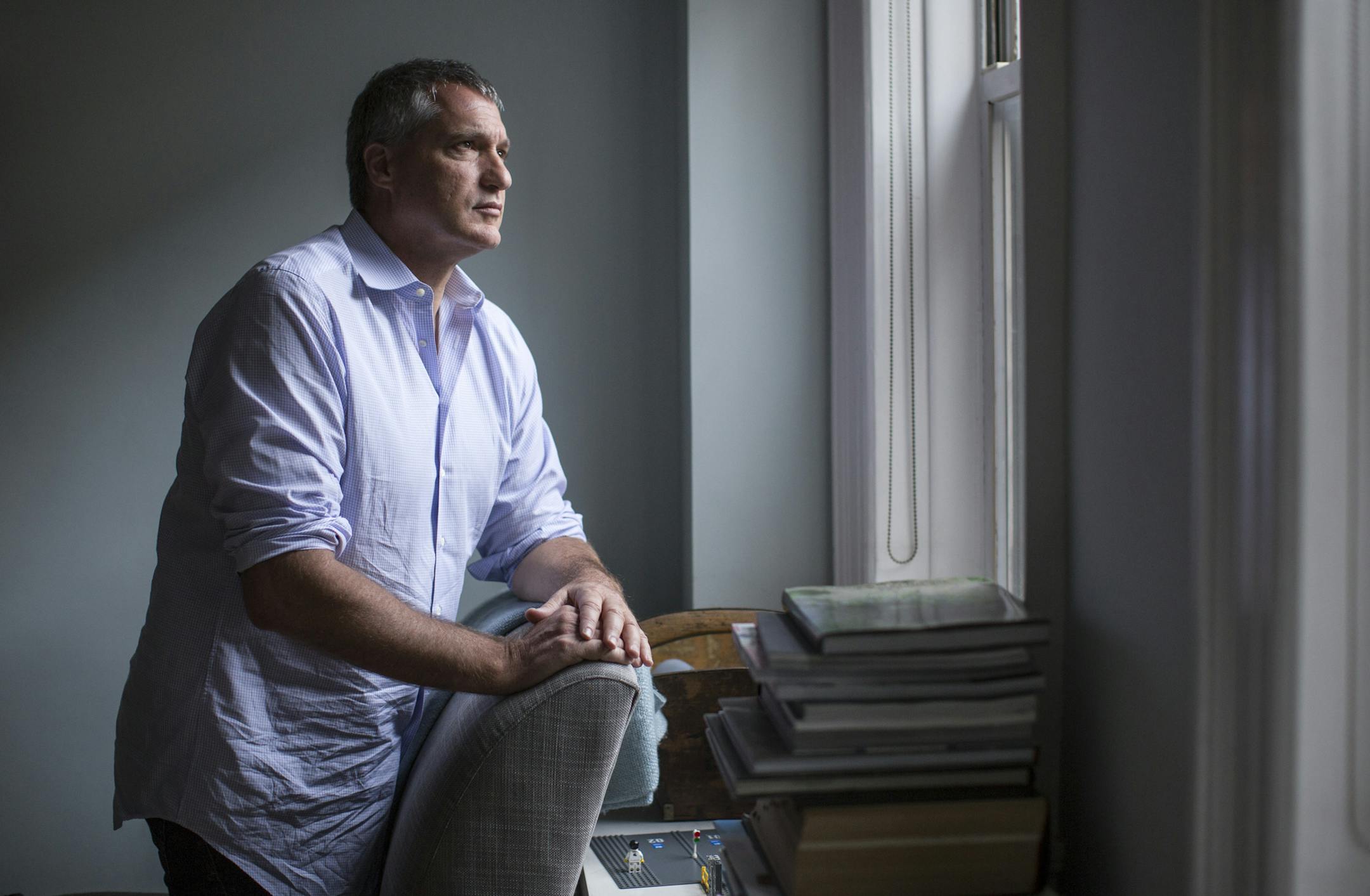 FILE -- Steven Donzinger, who has been suing Chevron for 20 years due to a toxic waste spill in Ecuador, at home in New York, July 1, 2013. In a big victory for Chevron, a federal judge ruled on March 4, 2014 that the two-decade legal effort to punish the company for polluting the Ecuadorean rain forest was marred by fraud and corruption of the Ecuadorean judicial system. (Fred R. Conrad/The New York Times)
