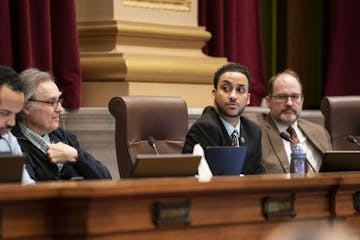 Council Member Phillipe Cunningham, center, the author of the ordinance, said that he felt a sense of "wow, we have a serious safety net gap here."