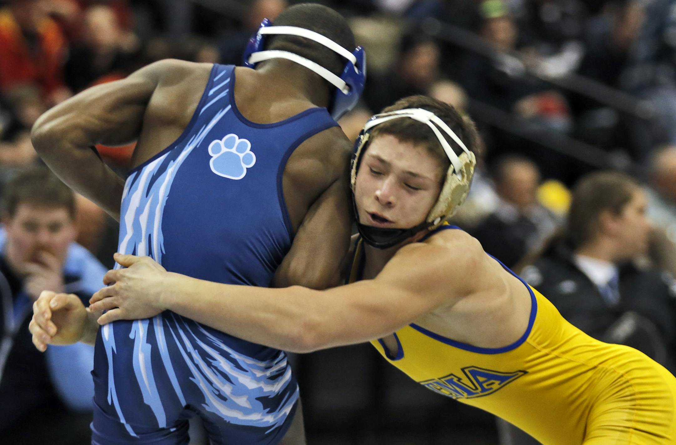 St. Michael-Albertville's Mitchell McKee, right, wrestled Blaine's Malik Stewart in the 3A 120 lb championship match. McKee won the match. [ Prep State Wrestling Individual Championships (MARLIN LEVISON/STARTRIBUNE(mlevison@startribune.com)
