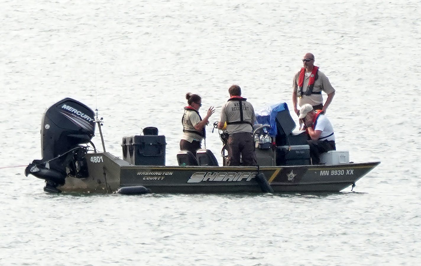 Washington County Water Recovery personnel search with sonar for an airplane that went down in a quart near Grey Cloud Island between Cottage Grove and St. Paul Park. The search operation conditions are difficult, as the quarry walls are sand-based and the quarry itself is up to 200 feet deep in places. brian.peterson@startribune.com St. Paul, MN Monday, September 14, 2020