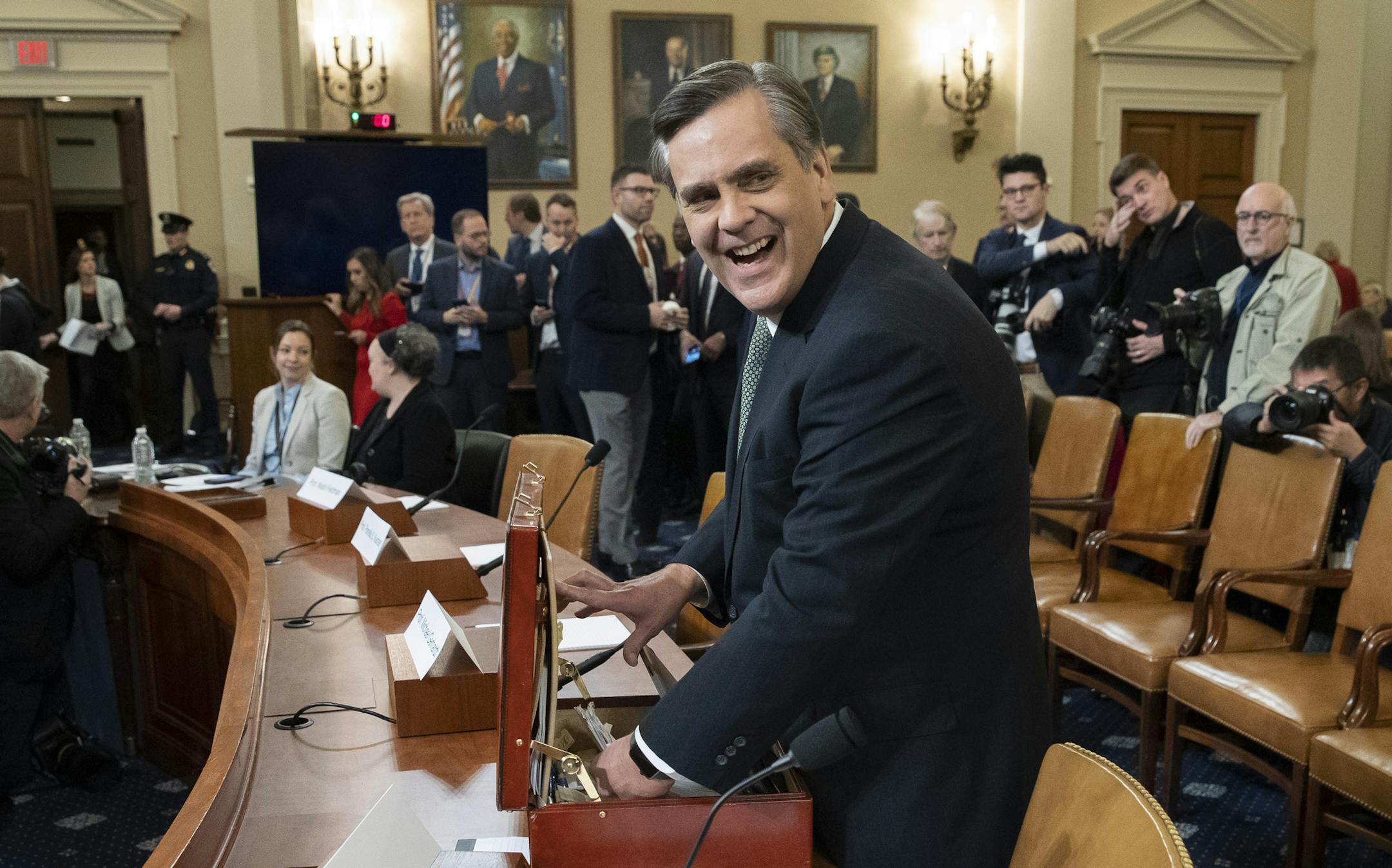 George Washington University Law School professor Jonathan Turley arrives to testify for a hearing before the House Judiciary Committee on the constitutional grounds for the impeachment of President Donald Trump, on Capitol Hill in Washington, Wednesday, Dec. 4, 2019. (AP Photo/Alex Brandon)