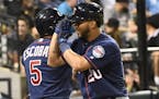 Eduardo Escobar, left, and Eddie Rosario have combined for 39 percent of the Twins' home runs, 33 percent of their RBI and 33 percent of their extra-b