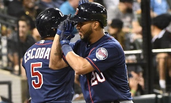 Eduardo Escobar, left, and Eddie Rosario have combined for 39 percent of the Twins' home runs, 33 percent of their RBI and 33 percent of their extra-b