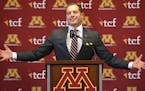 Newly named University of Minnesota football coach P.J. Fleck gestures as he spoke during a press conference Friday Jan. 6, 2016 in Minneapolis, Minn.