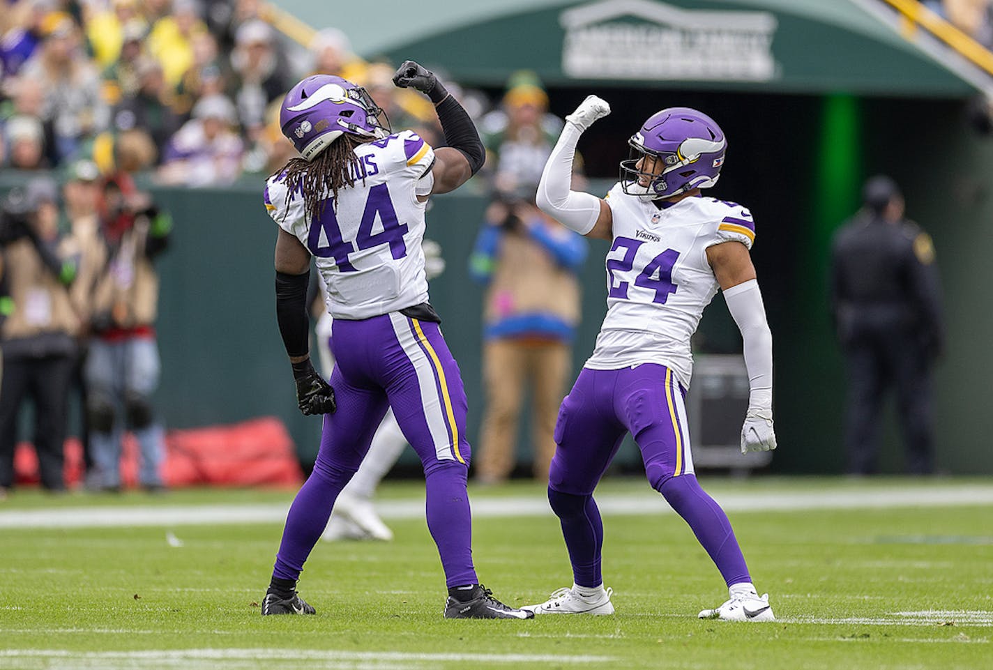 Vikings safety Josh Metellus (44), left, and Vikings safety Camryn Bynum (24) celebrate a play in the first quarter at Lambeau Field in Green Bay, Wis., on Sunday, Oct. 29, 2023. This drive led to a touchdown. ] Elizabeth Flores • liz.flores@startribune.com ORG XMIT: MIN2310291538280096