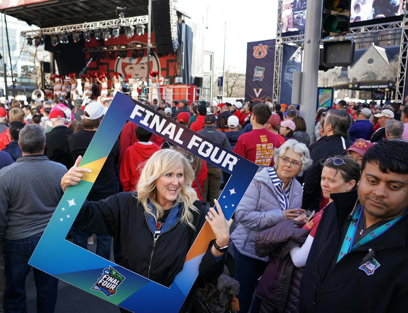 A Texas Tech fan from Lubbock, Texas, framed her big smile at a pep rally on Nicollet Mall before the big game Monday night in Minneapolis.