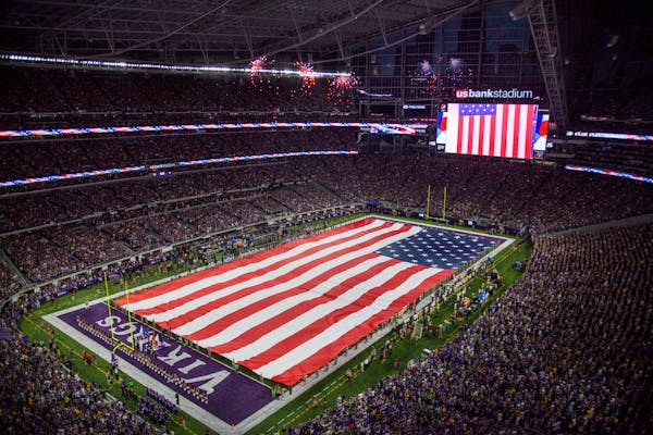 A giant American flag was unfurled before the Vikings played the Packers in 2016 at U.S. Bank Stadium.