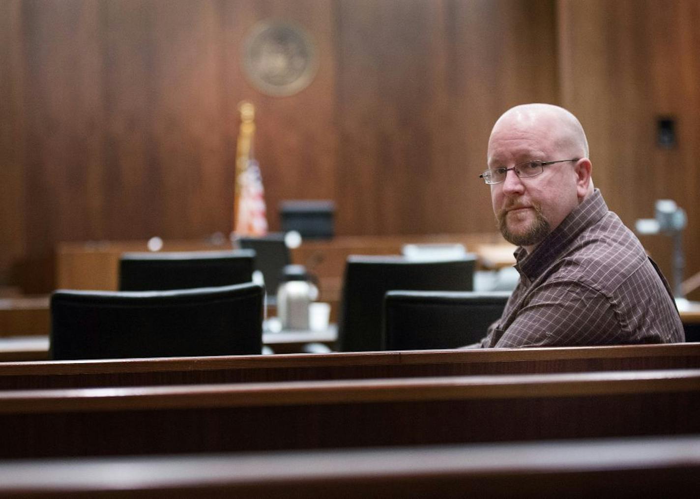 Sketch artist Cedric Hohnstadt photographed in courtroom St. Paul, MN.