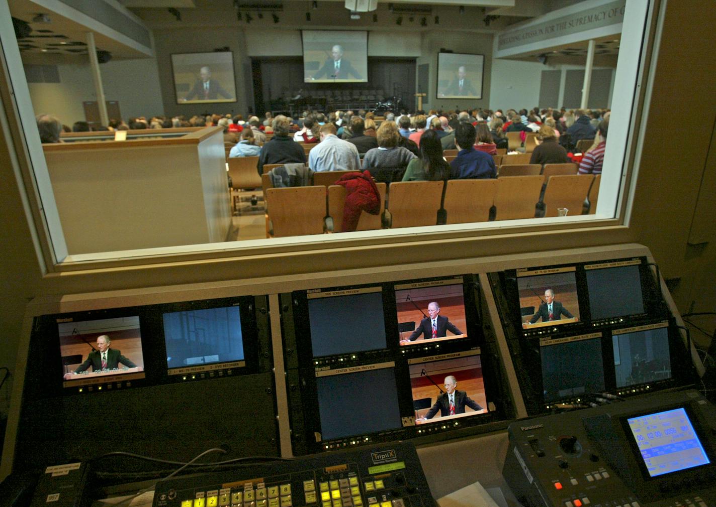 Worshipers at the Bethlehem Baptist Church satellite in Mounds View listened to a taped sermon by the Rev. John Piper during a recent Sunday service. The sermon was recorded during the previous evening's service at the church's main Minneapolis campus.