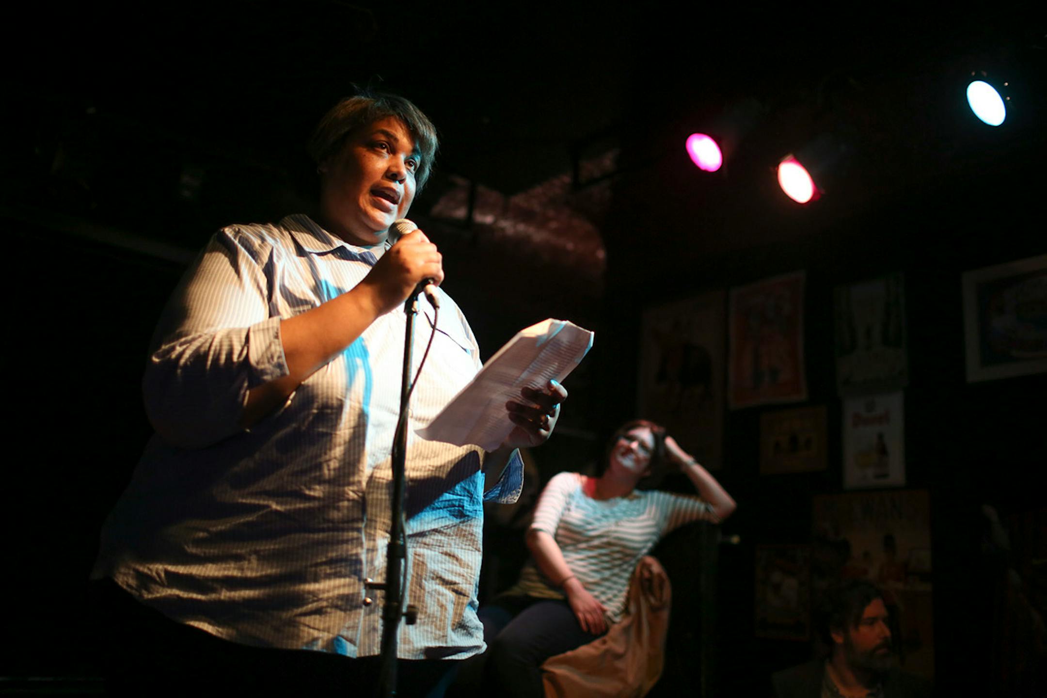Roxane Gay read from her work Wednesday night at Nomad World Pub during the Literary Death Match. She was up against Claire Vaye Watkins, right. ] JEFF WHEELER ï jeff.wheeler@startribune.com One of the off-site events at the start of the AWP Conference & Bookfair was the Literary Death Match Wednesday night, April 8, 2015 at Nomad World Pub in Minneapolis. Four writers read their work and were judged by a panel of three all star judges.