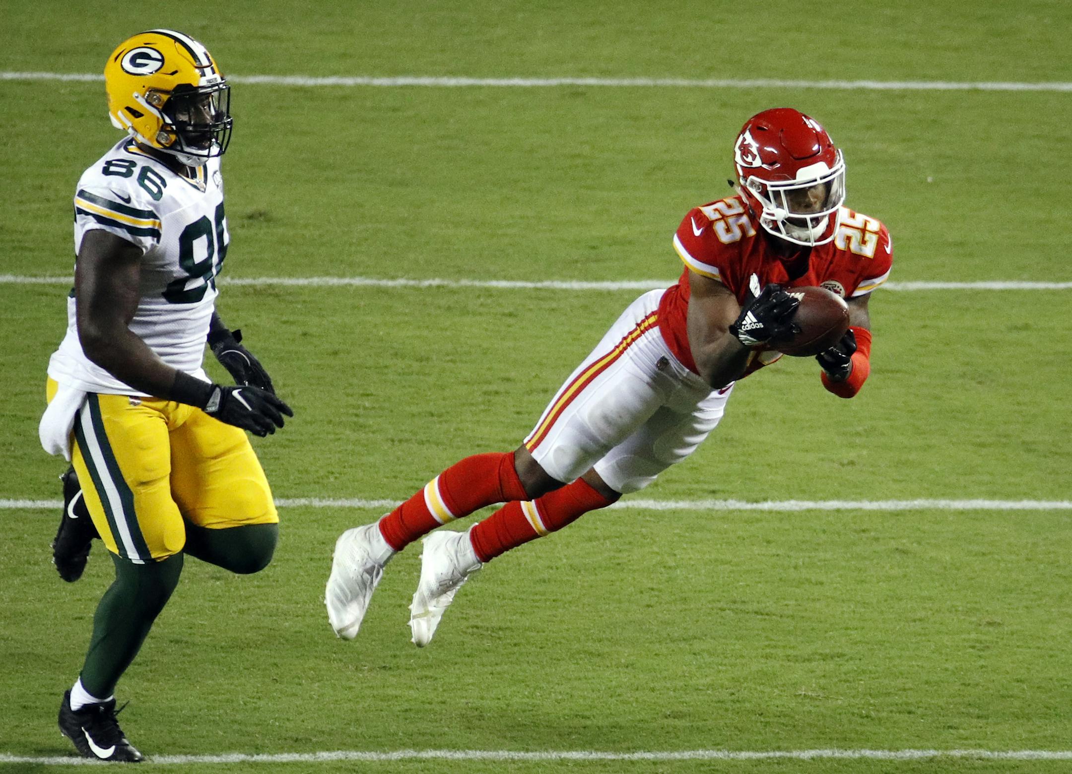 Kansas City Chiefs safety Armani Watts (25) intercepts a pass intended for Green Bay Packers tight end Emanuel Byrd (86) during the second half of an NFL preseason football game in Kansas City, Mo., Thursday, Aug. 30, 2018. (AP Photo/Charlie Riedel)