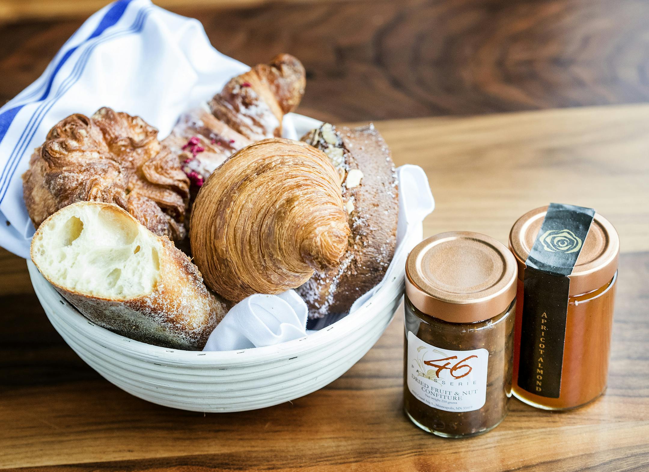 Bread Basket with Kouign - Amann, baguette, croissant, raspberry croissant, brioche bostock, apricot almond jam and bread and nut jam at Rose Street Patisserie in Minneapolis, MN. ] CARLOS GONZALEZ cgonzalez@startribune.com - October 12, 2016, Minneapolis, MN, Patisserie 46 and Rose Street Patisserie baker/owner John Kraus was just inducted into Relais Desserts, an exclusive French fraternity of 100 of the world's top pastry chefs. He's the first American-born chef to be so honored.