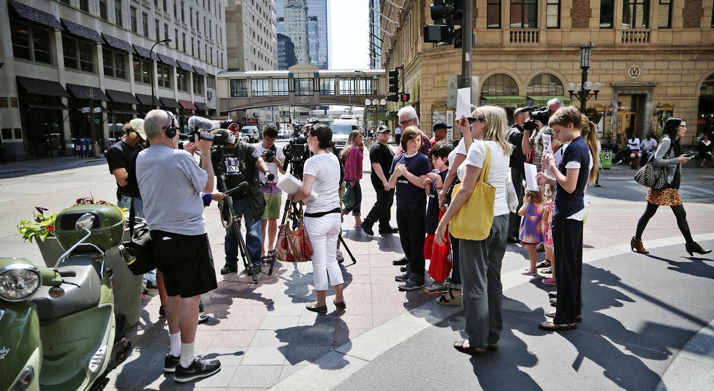 Local members of Moms Demand Action for Gun Sense in America gathered outside the downtown Target Store on the Nicollet Mall to protest Target's policy of allowing long guns in Target stores in other states Wednesday, June 11, 2014, in Minneapolis, MN. Here, Here, Leah Auckenthaler, the group's chapter leader, talked to media members before delivering the petition to the manager of the Target store where she said "she has been shopping there forever." Aukenthaler also said she, her children and