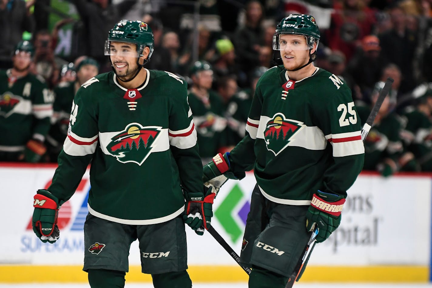 Minnesota Wild defenseman Matt Dumba (24) and defenseman Jonas Brodin (25) celebrated after Brodin scored a goal in the third period against the New York Islanders. ] AARON LAVINSKY • aaron.lavinsky@startribune.com