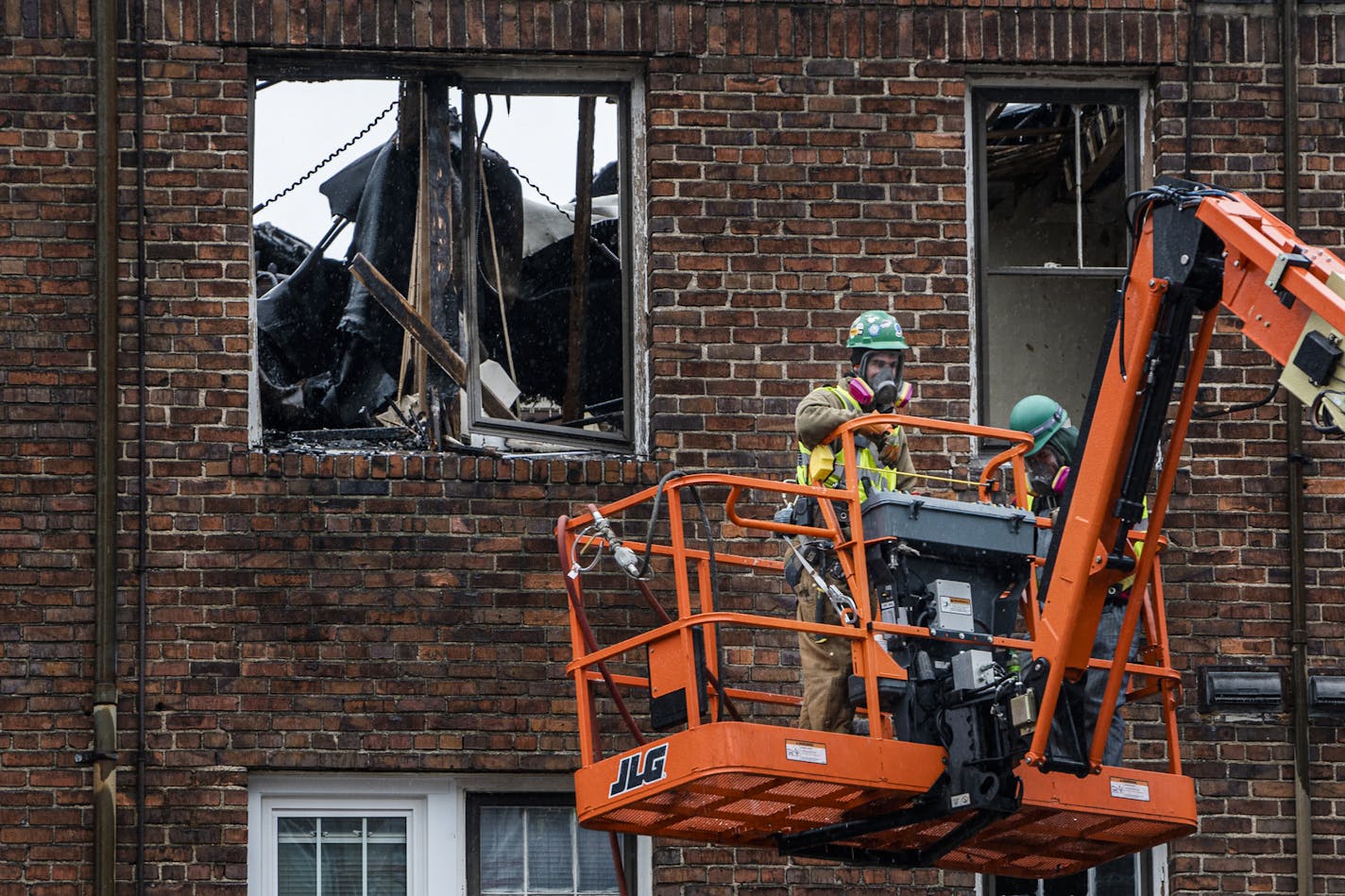 Careful demolition of the Francis Drake Hotel has begun in Minneapolis. Crew members used hazmat masks because of residue toxic fumes.