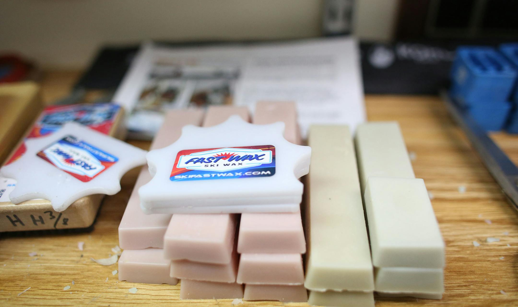 Some of the waxes made by Fast Wax on a shelf in owner Dan Meyer's maintenance room in the garage. ] (KYNDELL HARKNESS/STAR TRIBUNE) kyndell.harkness@startribune.com Fast Wax, a Lake Elmo ski wax company that makes wax for the U.S. Olympic ski team among others in Lake Elmo , Min., Tuesday, November 19, 2014.