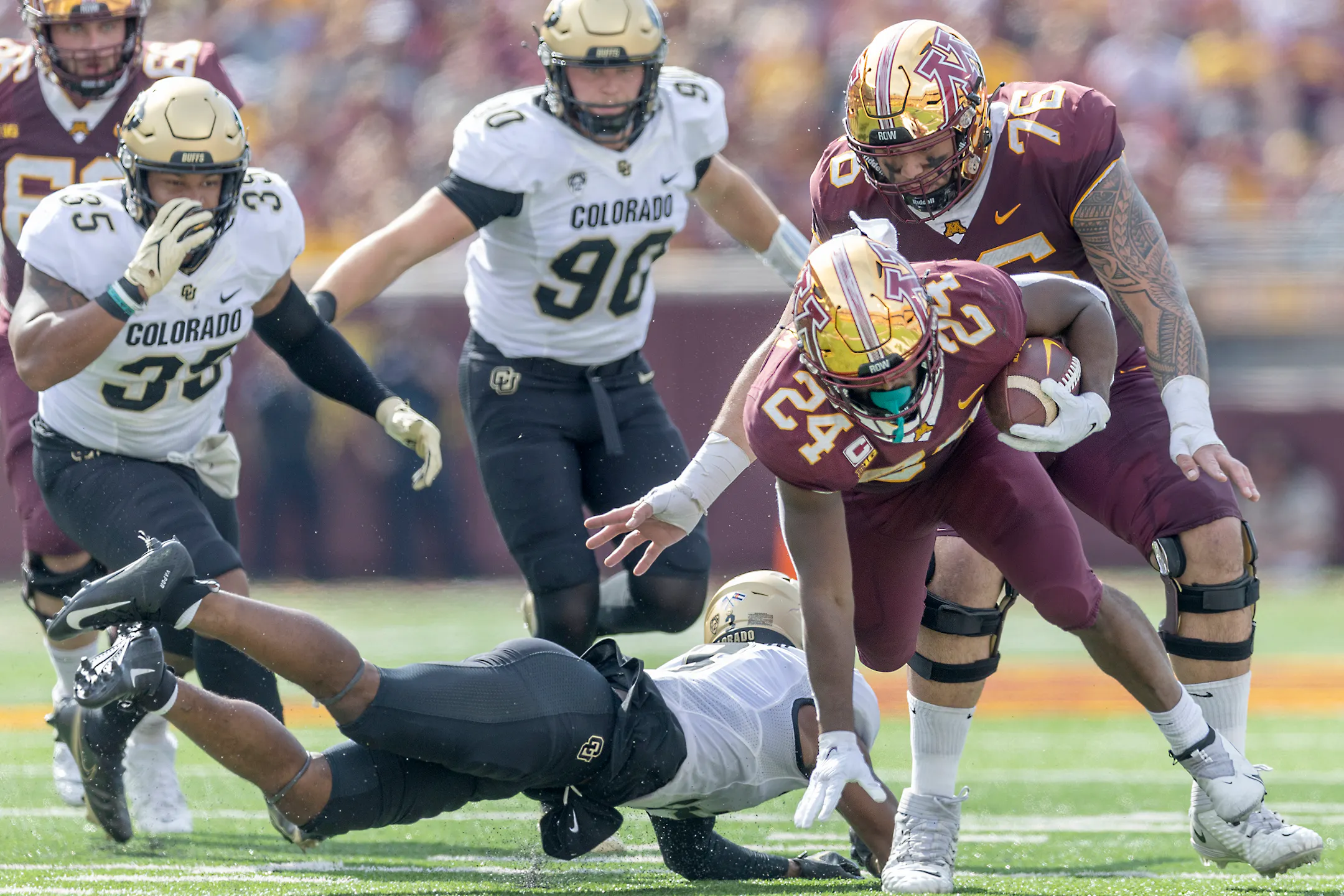 Autman Gophers steamroll Colorado 49-7 but lose receiver Chris Autman-Bell to ...