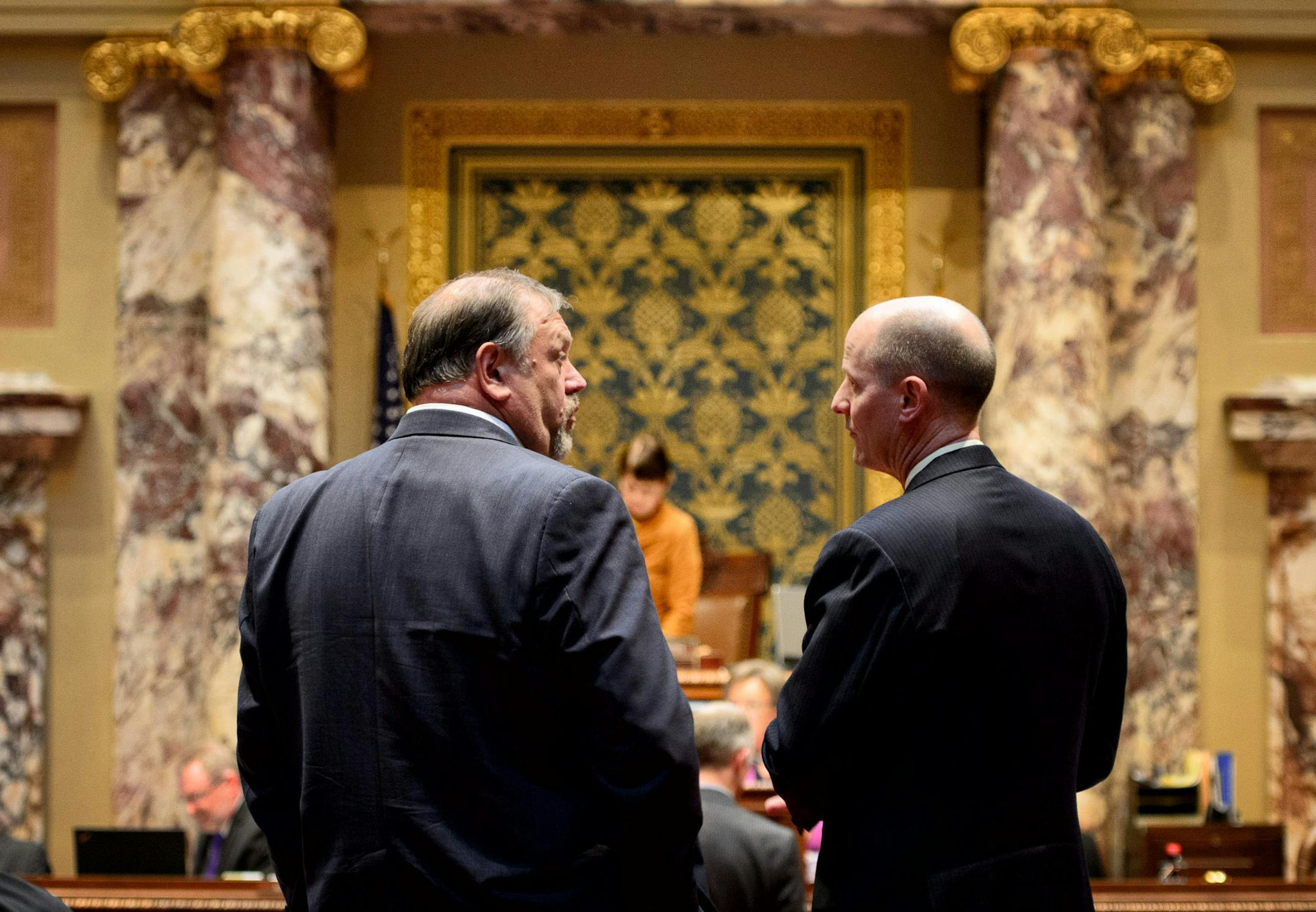 Majority Leader Tom Bakk, left, talked with Assistant Minority Leader Senator Paul Gazelka, R-Nisswa.