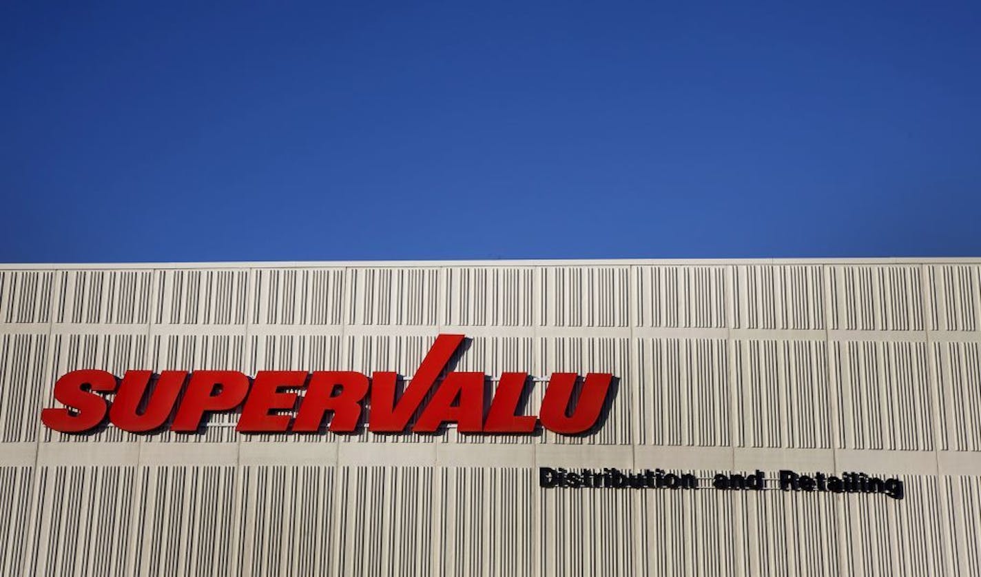 The Supervalu Inc. logo is displayed at a distribution center in Hopkins, Minnesota on Monday, Jan. 9, 2012. Inventories at U.S. wholesalers rose 0.1 percent following a 1.2 percent revised gain in October, Commerce Department figures showed today in Washington. Photographer: Ariana Lindquist/Bloomberg