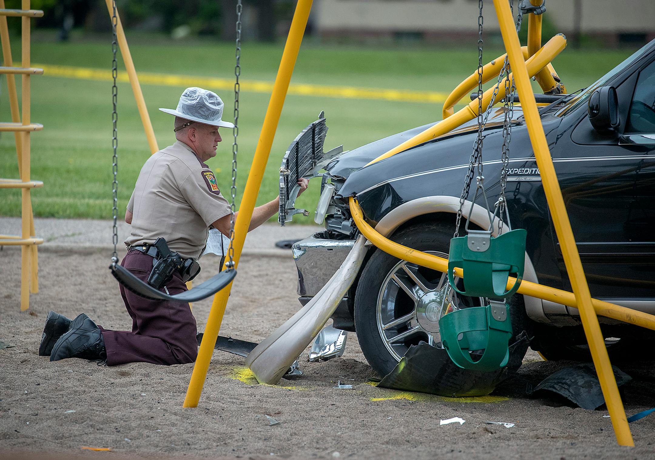 Minnesota State Patrol investigated the scene where a motorist being pursued by the State Patrol veered into a Minneapolis school playground and hit at least one child, Monday, June 11, 2018.