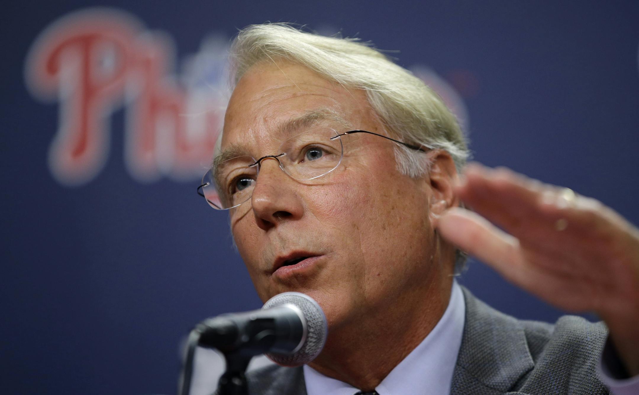 Veteran baseball executive Andy MacPhail speaks at a news conference before a baseball game between the Philadelphia Phillies and the Milwaukee Brewers, Monday, June 29, 2015, in Philadelphia. The Phillies hired MacPhail to serve as a special assistant to team president Pat Gillick for the rest of this season, then take over as team president once the season is finished. (AP Photo/Matt Slocum)