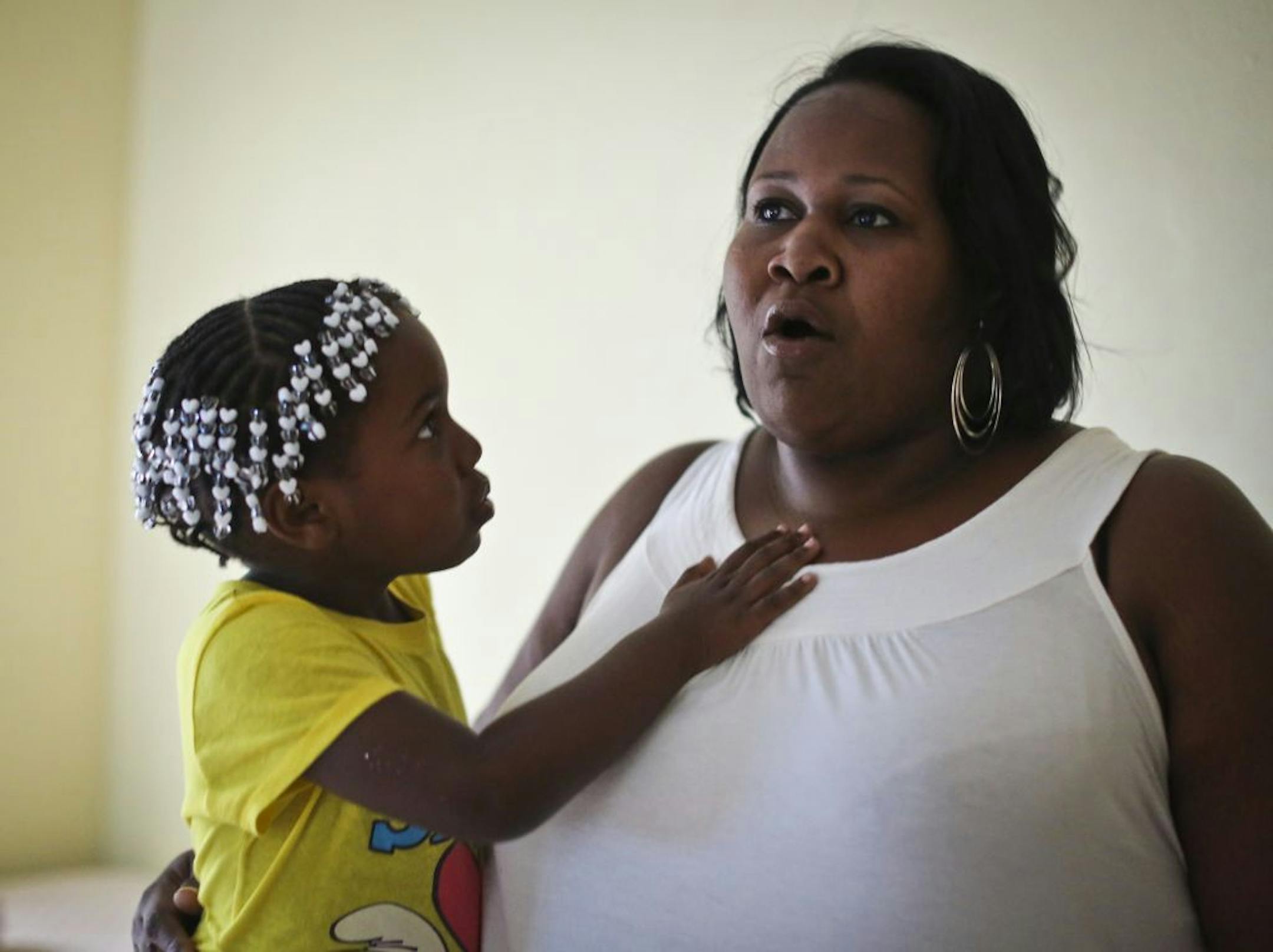 The county subsidizes day care for LaToya Surratt's 4-year-old daughter. "I'm still struggling to survive," she said.