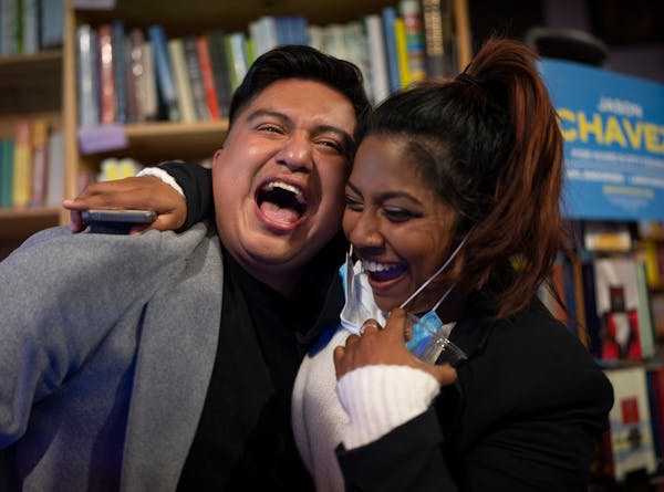Jason Chavez, newly elected council member representing the Ninth Ward, celebrated hearing the results with Aurin Chowdhury, his campaign manager at t
