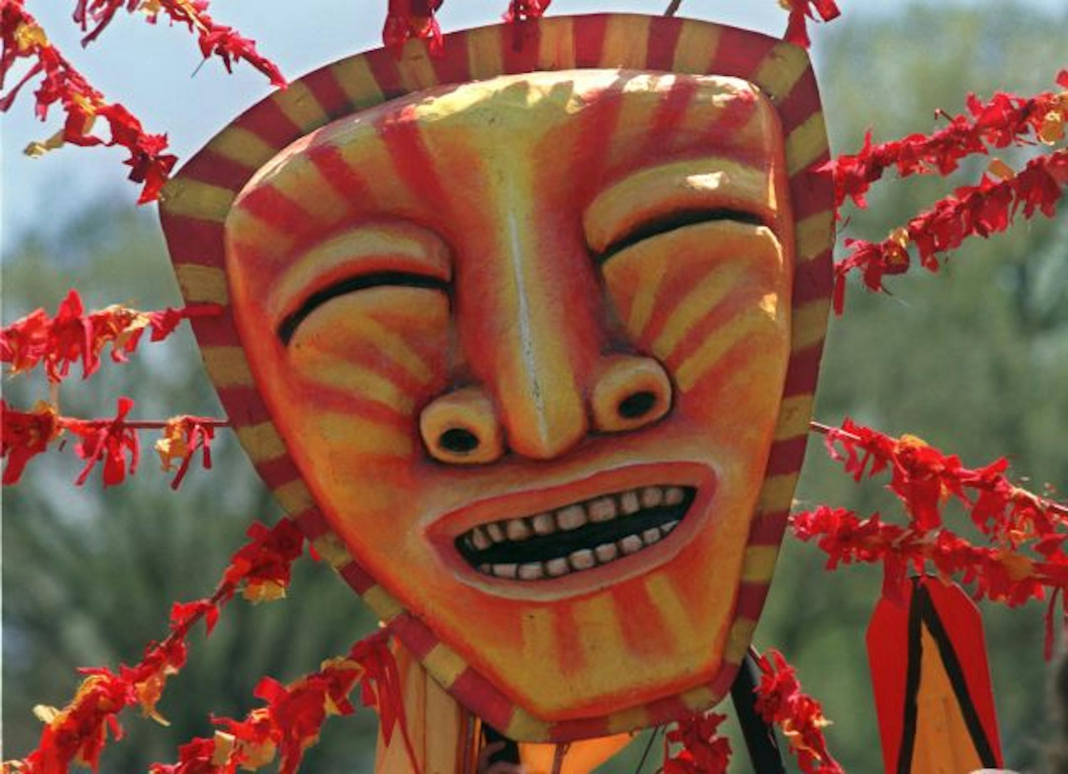 The Sun makes his appearance at the May Day Celebration in Powderhorn Park. The ritual of the returning sun has been a reoccuring theme for the First of May for millenia.