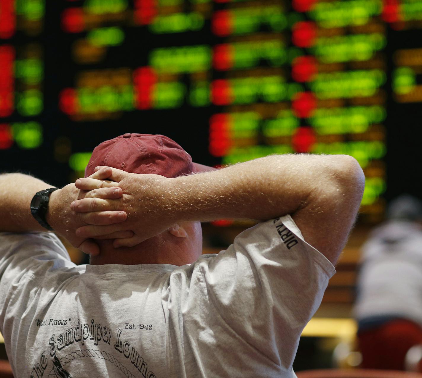 A man watched a baseball game in the sports book at the South Point hotel-casino in Las Vegas. The Supreme Court on Monday gave its go-ahead for states to allow gambling on sports across the nation, striking down a federal law that barred betting on football, basketball, baseball and other sports in most states.