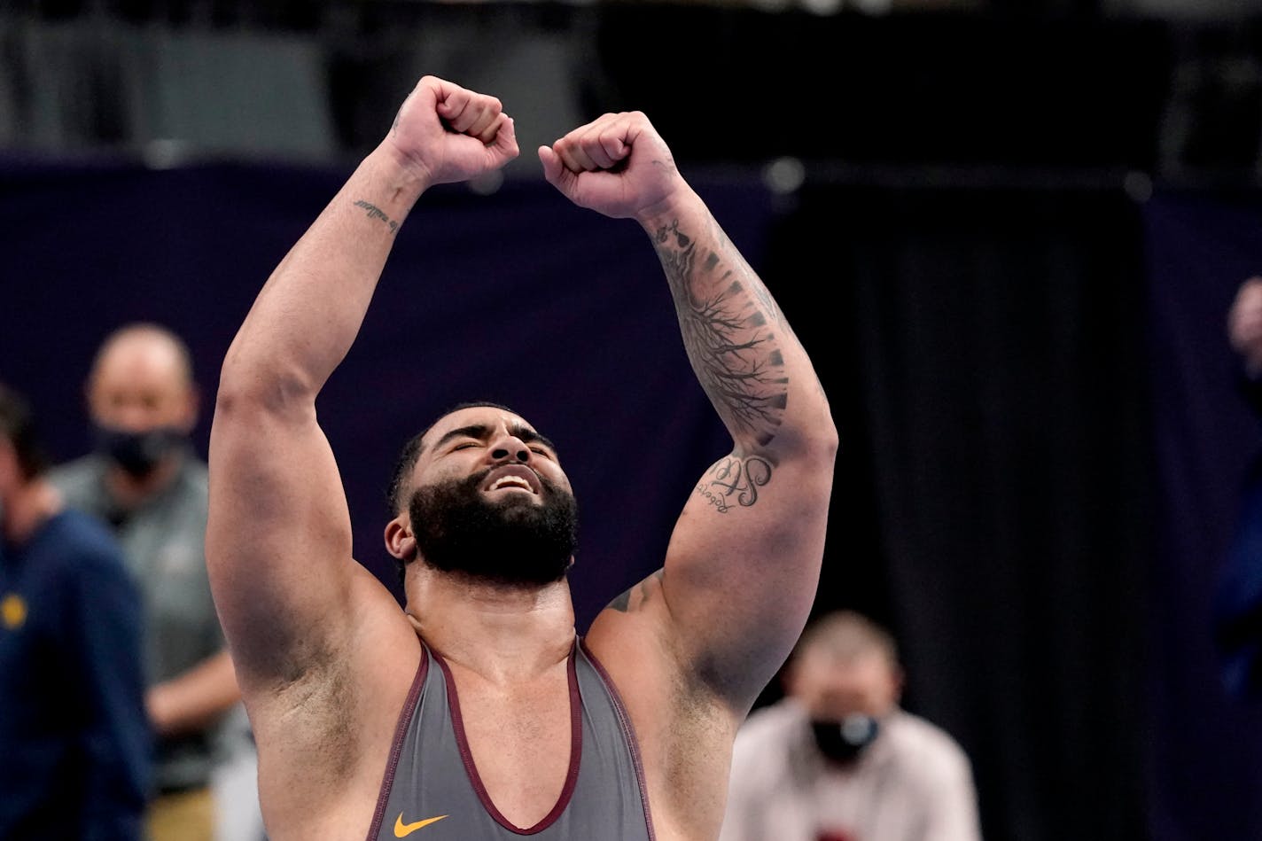 Minnesota's Gable Steveson celebrates after defeating Michigan's Mason Parris during their 285-pound match in the finals of the NCAA wrestling championships Saturday, March 20, 2021, in St. Louis. (AP Photo/Jeff Roberson)