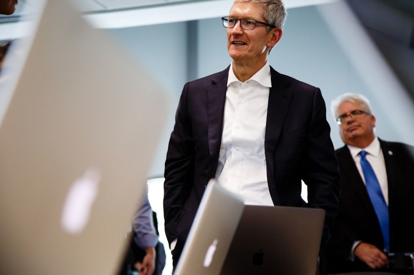 Apple CEO Tim Cook tours the Waukee Apex after announcing the companies plans for its data center on Thursday, Aug. 24, 2017, in Des Moines, Iowa. Iowa approved a deal Thursday to give Apple $208 million in state and local tax breaks to build two data storage centers near Des Moines and to create at least 50 jobs � a pact that critics quickly panned.