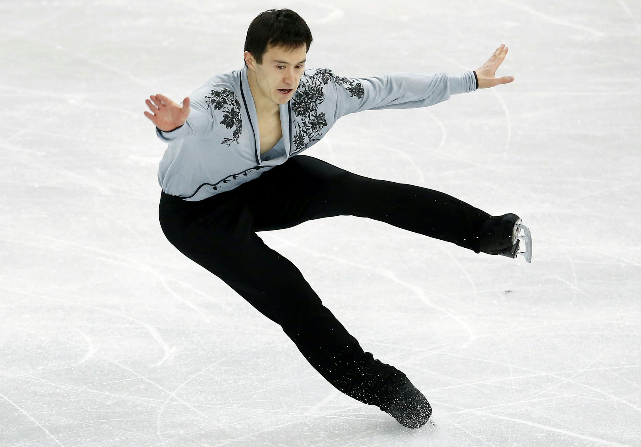 Patrick Chan of Canada stumbled during the men's free skate on Friday night at Iceberg Skating Palace. The silver medal went to Patrick Chan of Canada with a score of 275.62, while Denis Ten won the bronze medal to give Kazakhstan its first medal of the Sochi 2014 Olympic Winter Games. ] CARLOS GONZALEZ cgonzalez@startribune.com - February 14, 2013, Sochi, Russia, Sochi 2014 Winter Olympics, Iceberg Skating Palace, Men's Figure Skating Free Skate