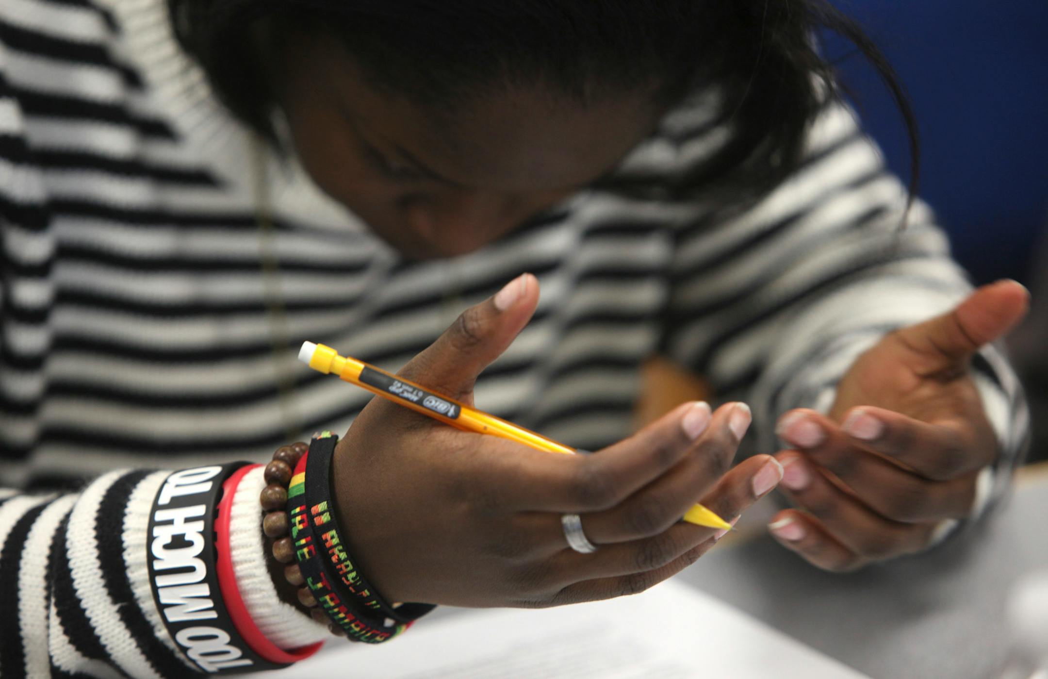 In this file photo, a student at Woodbury High School read a passage during a test prep class before taking the Minnesota Comprehensive Assessment.