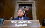 Sen. Joe Manchin, D-W.Va., arrived to chair the Senate Energy and Natural Resources Committee, at the Capitol in Washington, Tuesday, Oct. 5, 2021.