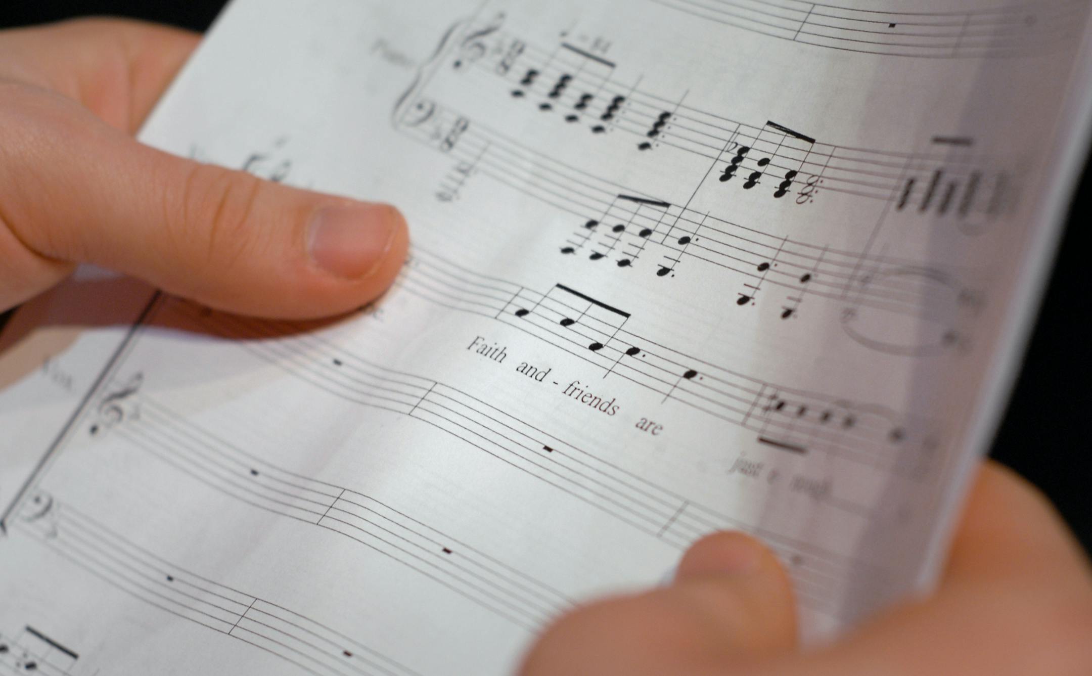 Kevin Kleman held sheet music as he rehearsed Wednesday at Henry Sibley High School. The show has at least 40 cast members, plus a few dozen more in the orchestra and handling backstage duties.