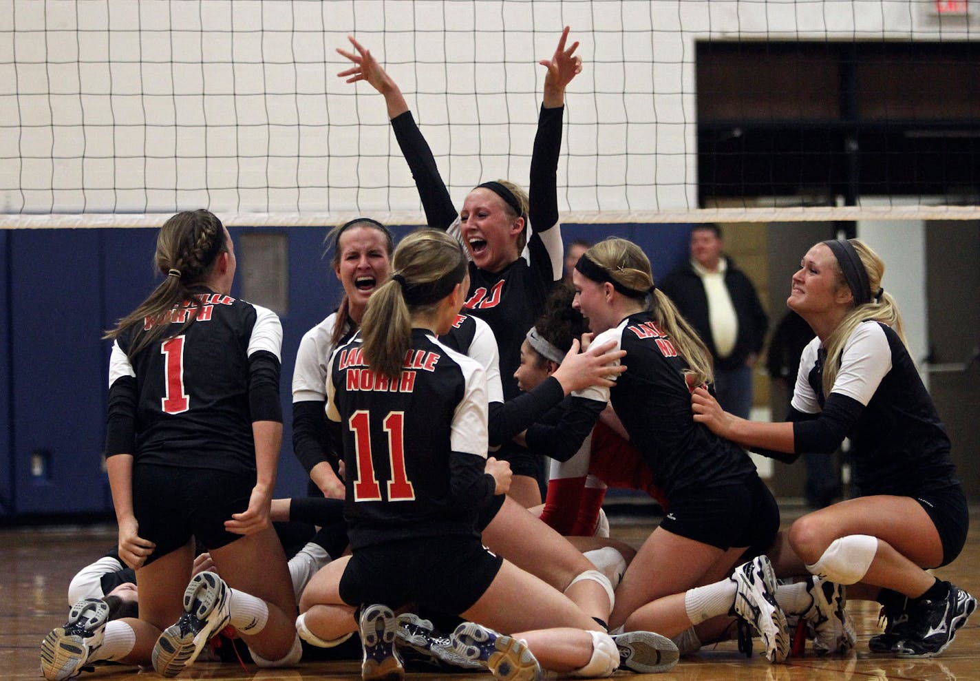 Lakeville North celebrated after winning the fifth and deciding game against Lakeville South during sectional finals Nov. 5. ] (KYNDELL HARKNESS/STAR TRIBUNE) kyndell.harkness@startribune.com