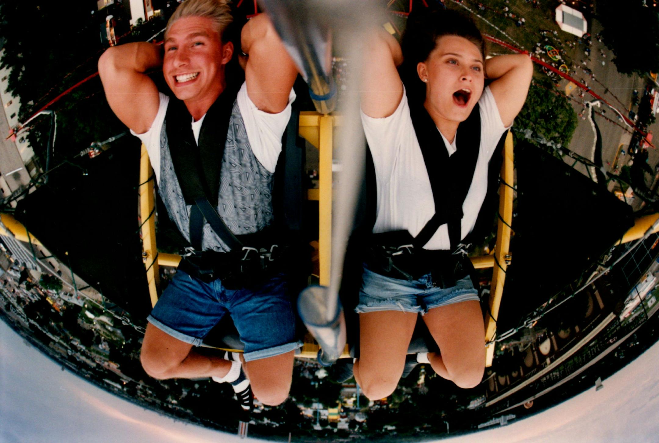 Aug. 25, 1994 — Dan Kussman, 20, and Michelle Majkrzak, 19, both of Minneapolis, rode the Ejection Seat ride during its inaugural year at the fair.